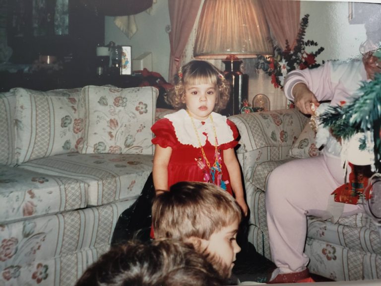 Kristina Curtin around age 5 at Christmas