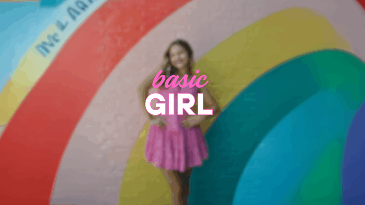 14-year-old girl with freshly balayaged hair , dressed in trendy back-to-school outfit, smiling in front of a mural.