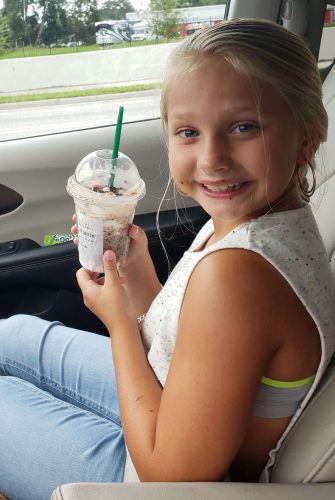 Scarlett with her Starbucks